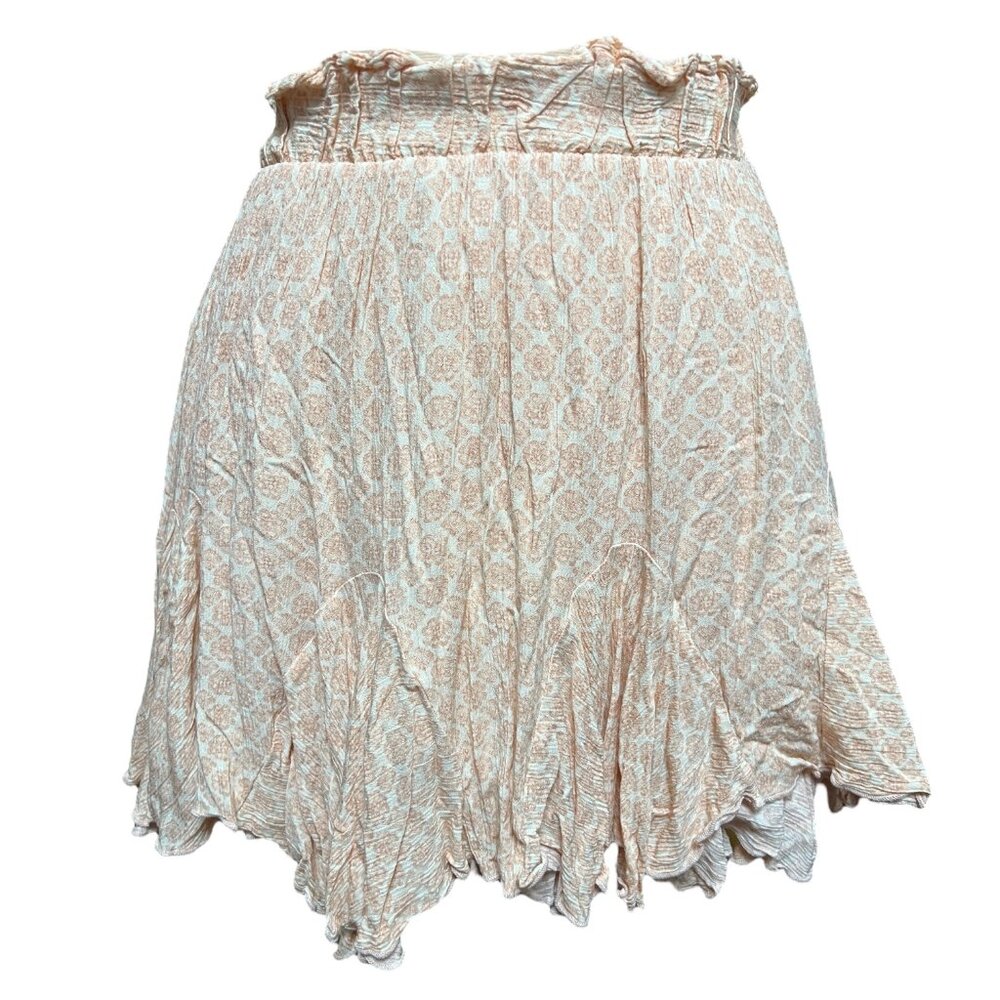 Light and dark peach skirt over shorts